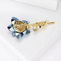 Faceted Rose Brooch With Faceted Crystals And Polished Metal Details view 3