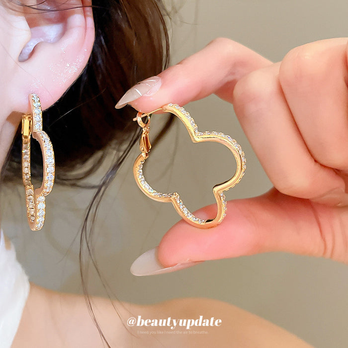 Gold Tone Crystal Clover Shaped Hoop Statement Earrings