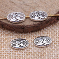 Embossed Double Flower Oval Metal Beads in Three Antique Finishes view 2