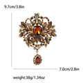 Ornate Crystal Floral Brooch In 9 Styles With Polished Metal And Decorative Details view 6