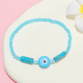 Faceted Bead Evil Eye Stretch Bracelets in Red and Random Colors view 3