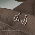 Gold Tone White Pearl Open Heart Drop Stud Earrings For Women view 3
