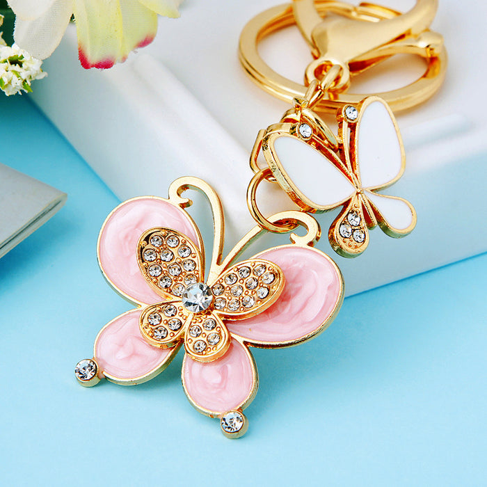 Mixed Cloud Pattern and Pearl Butterfly Pair Keychains in Four Designs