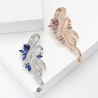 Blue silver and purple rose gold ribbon brooches