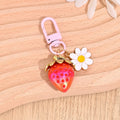 Gold-Tone Strawberry Charm Keychain With Daisy And Bee Accents view 11