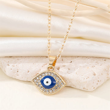 Gold Tone Crystal Outline Blue Evil Eye Pendant Necklace