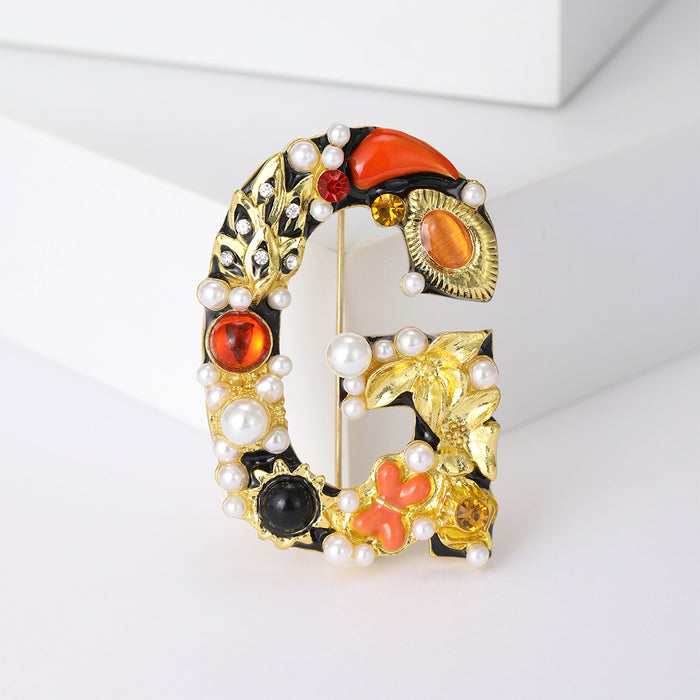 Jeweled Open Letter G Brooch With Colorful Accents