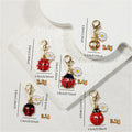 Gold Tone Daisy and Ladybug Lobster-Clasp Charms in Five Designs view 4