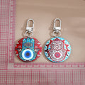 Silver Tone Round Printed Hamsa Eye Clip Keychains in Eight Designs view 5