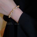 Gold Tone Elongated Link Bracelet With Clear Crystal Connectors view 1