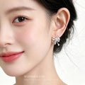 Silver-Tone Bow Stud Earrings Pearl Center and Drop view 2
