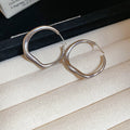 Irregular Rounded Hoop Earrings In Gold And Silver view 7