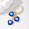 Gold Tone Triple Blue Evil Eye Split Ring Keychains view 2