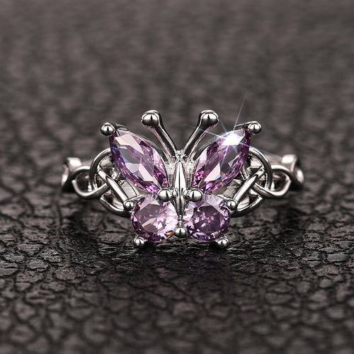 Product view showing silver-tone purple stone butterfly Celtic knot ring