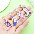 Western Cowboy Charm Keychains Featuring White Boot Across 55 Pictured Variations view 3