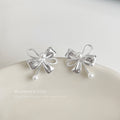 Silver-Tone Bow Stud Earrings Pearl Center and Drop view 1