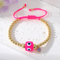 Gold Tone Beaded Cord Evil Eye Adjustable Bracelets in Seven Styles view 8