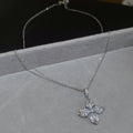 Silver Tone Four Petal Flower Crystal Pendant Necklace view 6