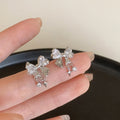 Silver Tone Crystal Bow and Star Drop Stud Earrings view 2