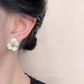 White Enamel Flower Stud Earrings Gold Stamen Clear CZ view 2