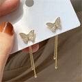 Gold Tone Butterfly Stud Earrings with Chain Tassels view 1