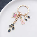 Pink-Led Music Note Piano Violin and Headphone Charm Keychain Collection view 1