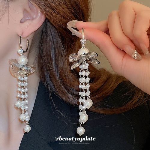 Lotus Pearl Tassel Drop Earrings shown in a close product view