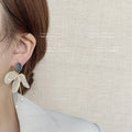 Dark Oval Top White Fabric Flower Pearl Tassel Stud Earrings view 2