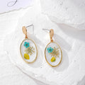 Oval Gold Rim Resin Dried Flower Stud Earrings 8 Colors view 3
