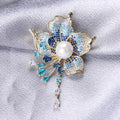 Flower Tassel Brooch in Metal with Layered Crystal Petals, Round Center, and Dangling Drop view 3