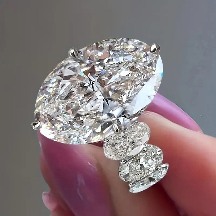 Oversized Oval Solitaire Three-Stone Ring In Silver Tone
