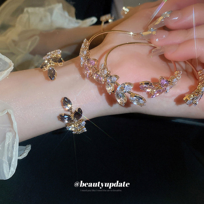 Gold Tone Leaf Crystal Open Bangle In Clear Pink Or Purple