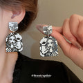 Black and White Abstract Face Portrait Stud Earrings view 1