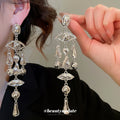 Silver Tone Oval Medallion Fringe Drop Earrings Decorative Jewelry Pair view 3