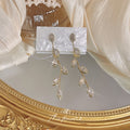 Gold Long Leaf Vine Crystal Dangle Earrings Clear Stones view 1