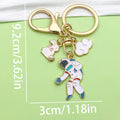 Gold-Tone Space Metal Keychains with Astronaut and Rocket Charms view 6