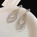 Layered Open Leaf Ear Clips in Gold and Silver Tone Finishes view 7