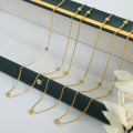 Gold Bezel Station Necklace Clear Crystal Spaced Cable Chain view 2