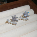 Snowflake and Pearl Stud Earrings in Gold or Silver Tone view 2