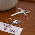 Silver Herringbone Ribbon Bow Stud Earrings Polished Metal view 2