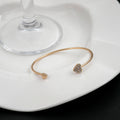 Gold Open Cuff Bracelet With Rhinestone And Plain Hearts view 2