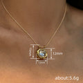 Gold Tone Geometric Emerald Cut Clear Pendant Necklace view 4