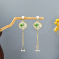 Bamboo Round Gold Tone Triple Chain Tassel Stud Earrings view 1