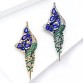 Spiral Seashell Brooch With A Long Openwork Shell Set With Blue, Green, And Clear Stones view 3