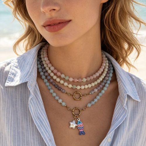 Painted fish charm necklace shown in an alternate product view