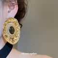 Textured Gold Tone Oval Stud Earrings With Brown Centers view 4