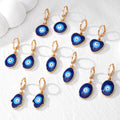 Gold Tone Blue Evil Eye Huggie Drop Earrings in Six Shapes view 1