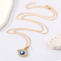 Gold Tone Crystal Outline Blue Evil Eye Pendant Necklace view 3