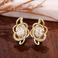 Gold Tone Floral Huggie Hoop Earrings With Clear Centers view 1