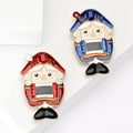 Whimsical Enamel Toy Soldier Brooch in Blue and Red Uniforms view 1